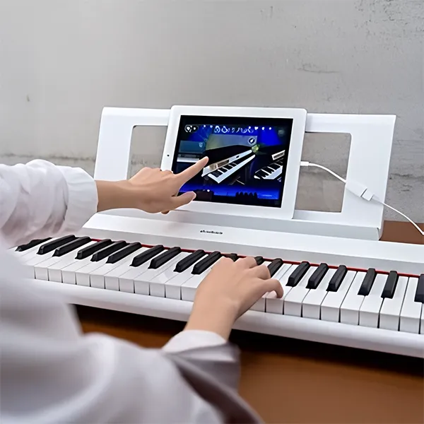 dan-piano-yamaha-np32-musiccity